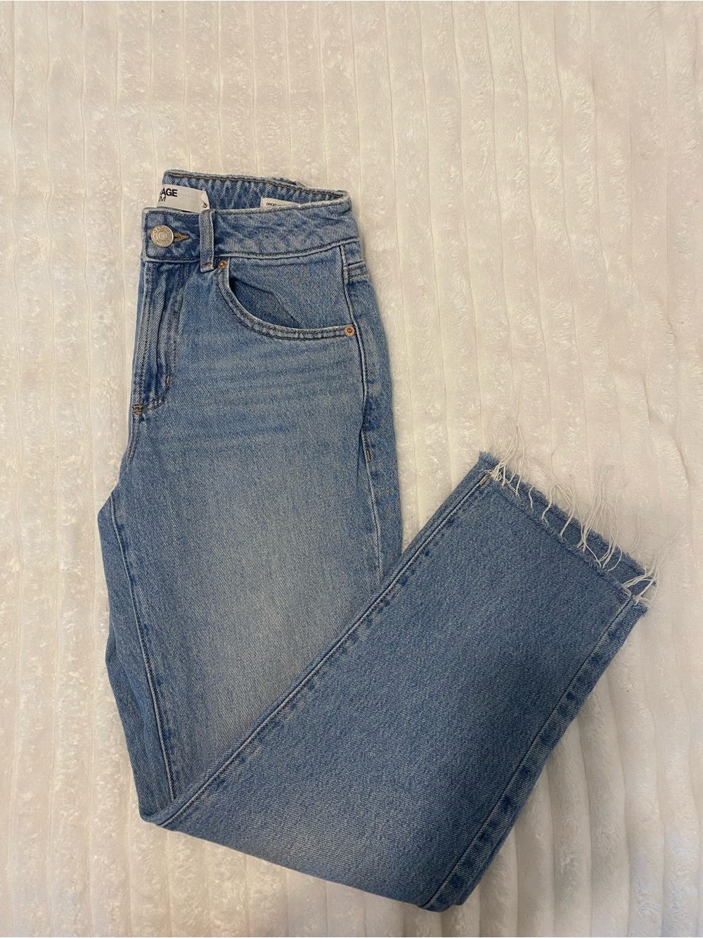 Medium Rise Light Blue Garage Jeans